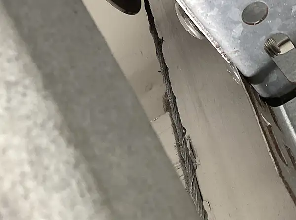 Repairing and replacing garage door cables